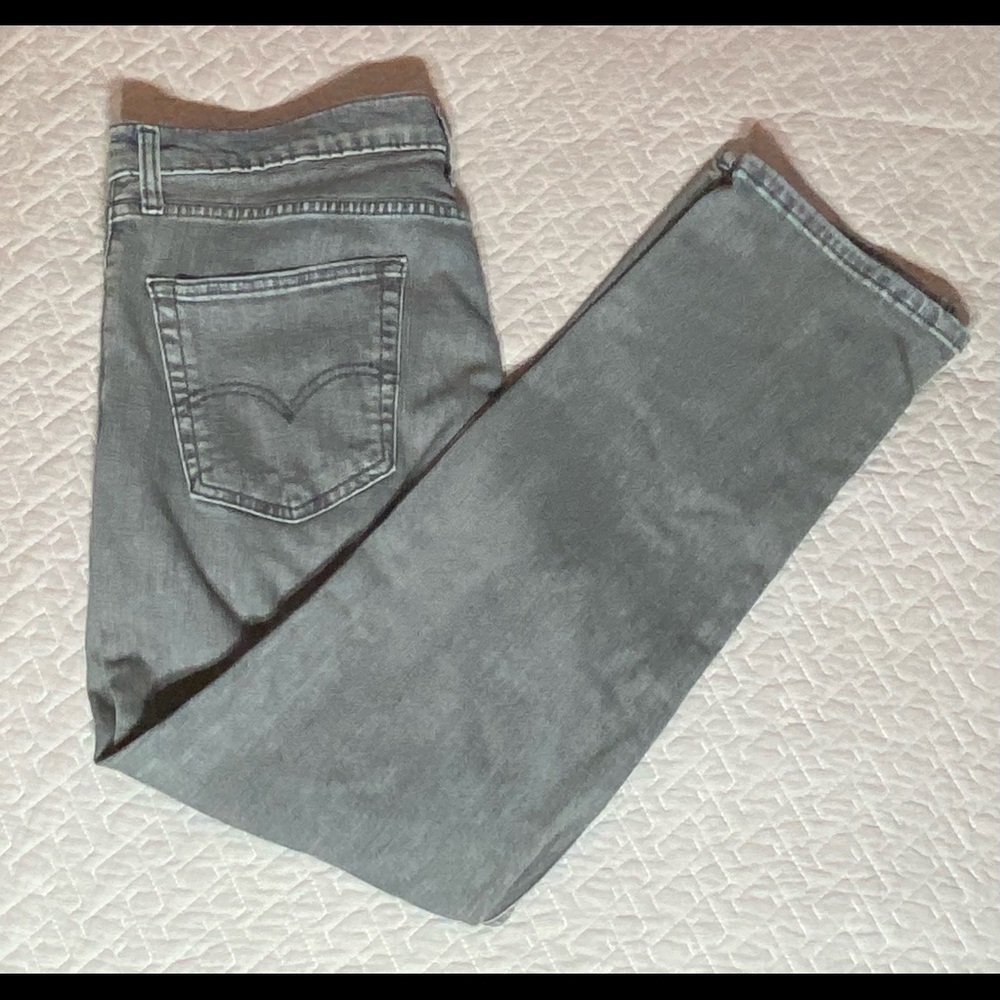Faded grey Levi’s jeans